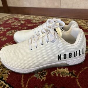Brand new! Womens size 10.5 or Mens size 9. 
NoBull Crossfit sneakers!